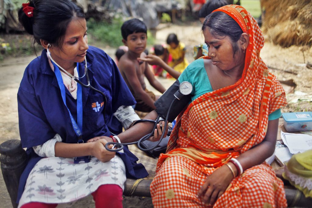 rural health worker testing patient